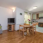 In Apartment *