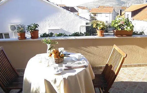 In Апартаменти